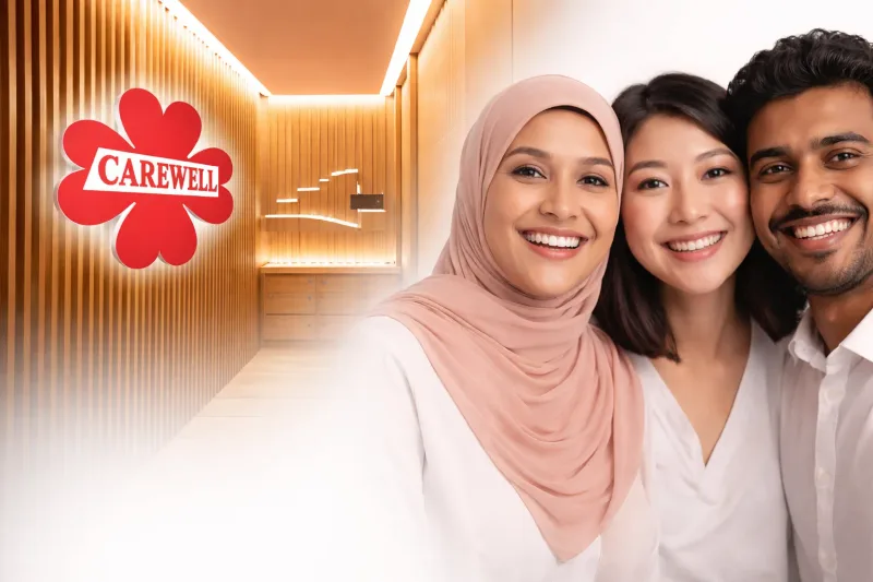 Smiling patients at Carewell Dental Clinic